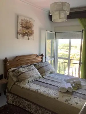 Cama o camas de una habitación en El Aroma del Dulce