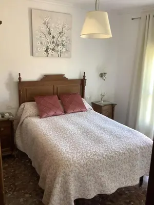 Cama o camas de una habitación en El Aroma del Dulce