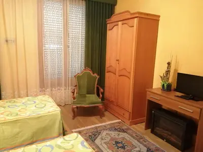 Una televisión o centro de entretenimiento en Casa Rural El Patio
