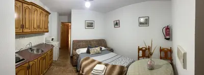 Cama o camas de una habitación en Apartamentos Coronichi