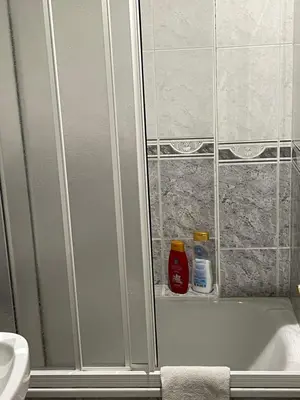 Un baño de Apartamentos Coronichi