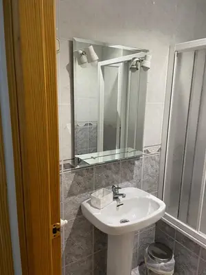 Un baño de Apartamentos Coronichi