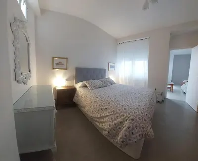 Cama o camas de una habitación en La Casa del Bienestar