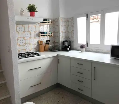Una cocina o zona de cocina en La Casa del Bienestar
