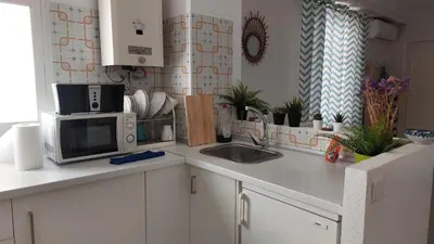 Una cocina o zona de cocina en La Casa del Bienestar
