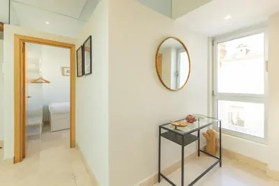 Cama o camas de una habitación en Tentudia Charming Apartments with Private Roof-Top or Patio in San Bernardo By OCityzen