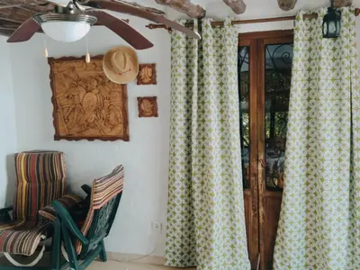 Zona de estar de La Casita Verde Valle