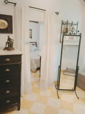 Cama o camas de una habitación en La Casita Verde Valle