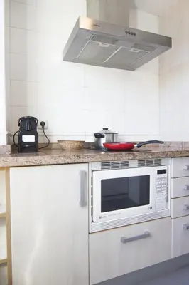 Una cocina o zona de cocina en RentalSevilla Concejal Alberto Jiménez-Becerril
