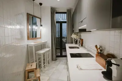 Una cocina o zona de cocina en Tú casa con patio en La Alameda