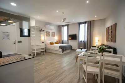 Cama o camas de una habitación en EM21 Apartamentos