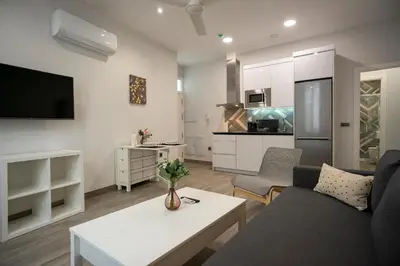 Una televisión o centro de entretenimiento en EM21 Apartamentos