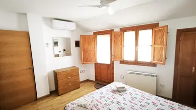 Cama o camas de una habitación en Dúplex San Lorenzo 2 PARKING GRATUITOS Y PISCINA