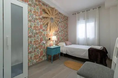 Cama o camas de una habitación en El Refugio de La Corredera & Parking Incluido