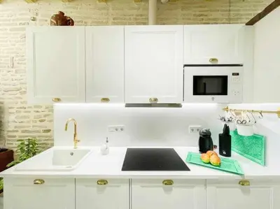 Una cocina o zona de cocina en Juderia de Sevilla VI - Luxury Apartments