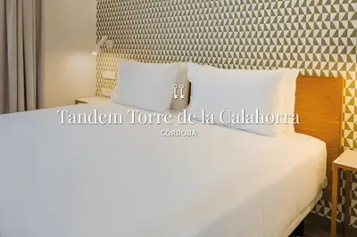 Cama o camas de una habitación en Tandem Torre de la Calahorra