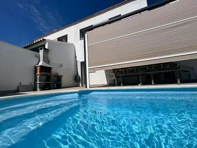 Piscina en o cerca de Casa Rural Cascadas del Hueznar