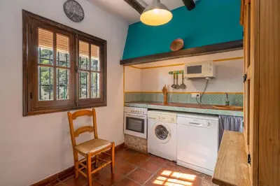 Una cocina o zona de cocina en El Chorro Villas Casa Rosaleda