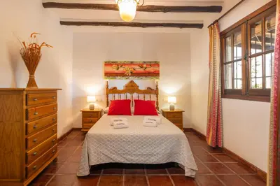 Cama o camas de una habitación en El Chorro Villas Casa Rosaleda