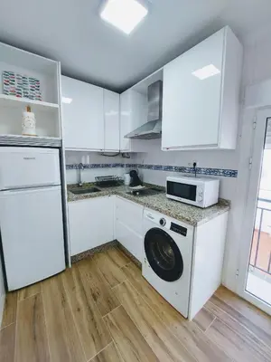 Una cocina o zona de cocina en Sol Centro Apartment B