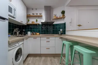 Una cocina o zona de cocina en La Cupula de Gran Capitan