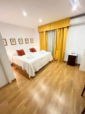 Cama o camas de una habitación en Apartamento centro ciudad con parking incluido