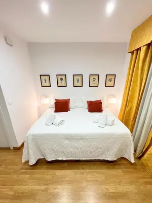 Cama o camas de una habitación en Apartamento centro ciudad con parking incluido