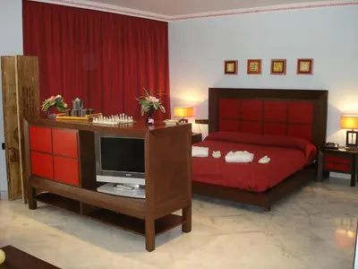 Cama o camas de una habitación en Hotel Hacienda Don Manuel