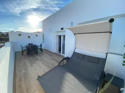Un balcón o terraza de Ático CARMEN