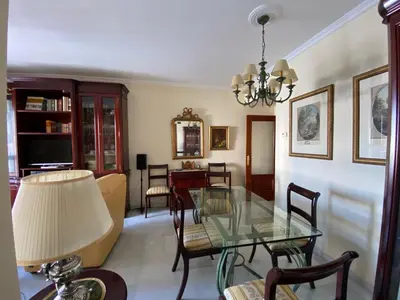 Una televisión o centro de entretenimiento en fantástico apartamento con parking avenida de cadiz