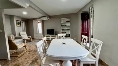 Una televisión o centro de entretenimiento en Vivienda Paseo 9 Baeza