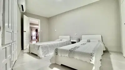 Cama o camas de una habitación en Vivienda Paseo 9 Baeza