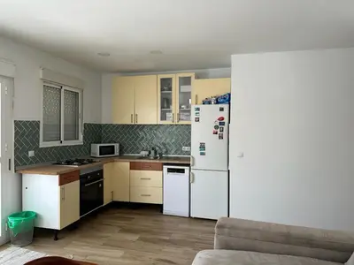 Una cocina o zona de cocina en ATICO AMPLIO Y LUMINOSO