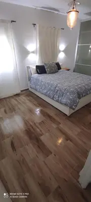 Cama o camas de una habitación en ATICO AMPLIO Y LUMINOSO