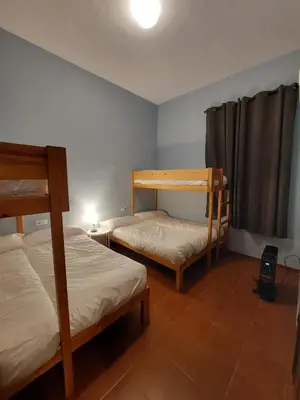 Cama o camas de una habitación en Casa Rural ESTACIÓN DEL SOLDADO