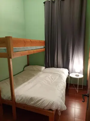 Cama o camas de una habitación en Casa Rural ESTACIÓN DEL SOLDADO