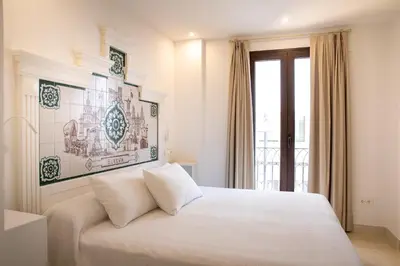 Cama o camas de una habitación en Posada Boutique El Gallo Morón