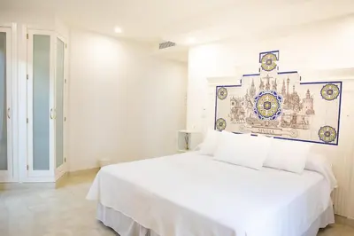 Cama o camas de una habitación en Posada Boutique El Gallo Morón