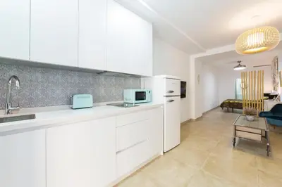 Una cocina o zona de cocina en Precioso loft El Arcángel junto a la Ribera