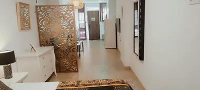Una televisión o centro de entretenimiento en Precioso loft El Arcángel junto a la Ribera
