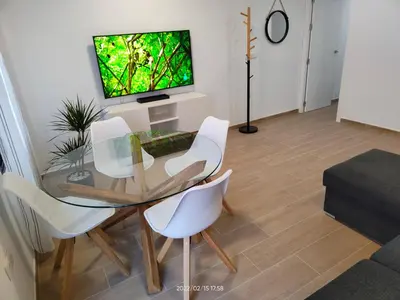 Una televisión o centro de entretenimiento en MiRa Los Patios