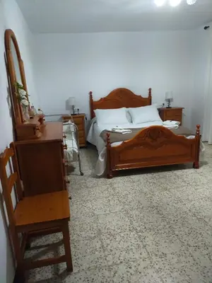Cama o camas de una habitación en Alojamiento Rural Los Barrosos