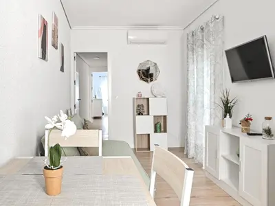 Una televisión o centro de entretenimiento en Apartamento La Pastora