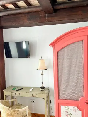 Una televisión o centro de entretenimiento en Hostal Servilia
