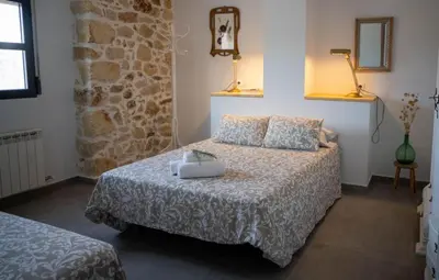 Cama o camas de una habitación en Alojamiento rural La Granja de Las Monjas