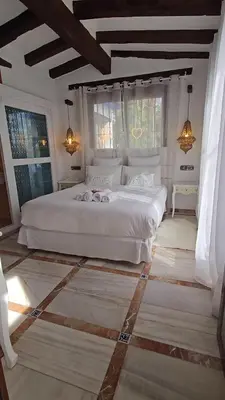 Cama o camas de una habitación en Casa privada para dos con Jacuzzi y Piscina Málaga