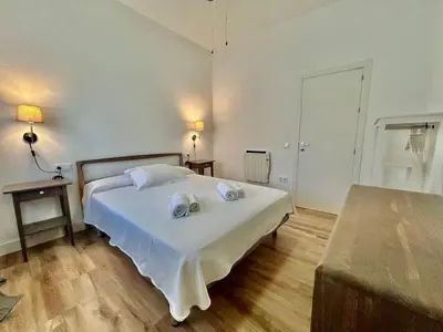Cama o camas de una habitación en Acogedor apt 6pax 3Bdr 2Bth - CozyHomeSevilla5