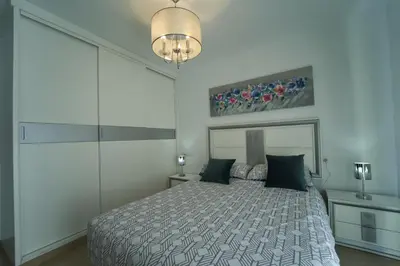 Cama o camas de una habitación en El Balcón V