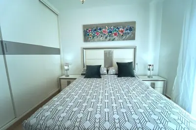 Cama o camas de una habitación en El Balcón V