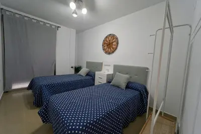 Cama o camas de una habitación en El Balcón V